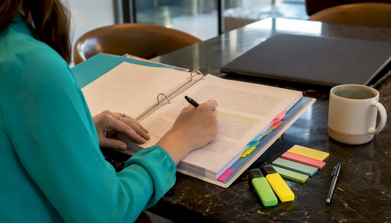 Close-up of hiring compliance documents